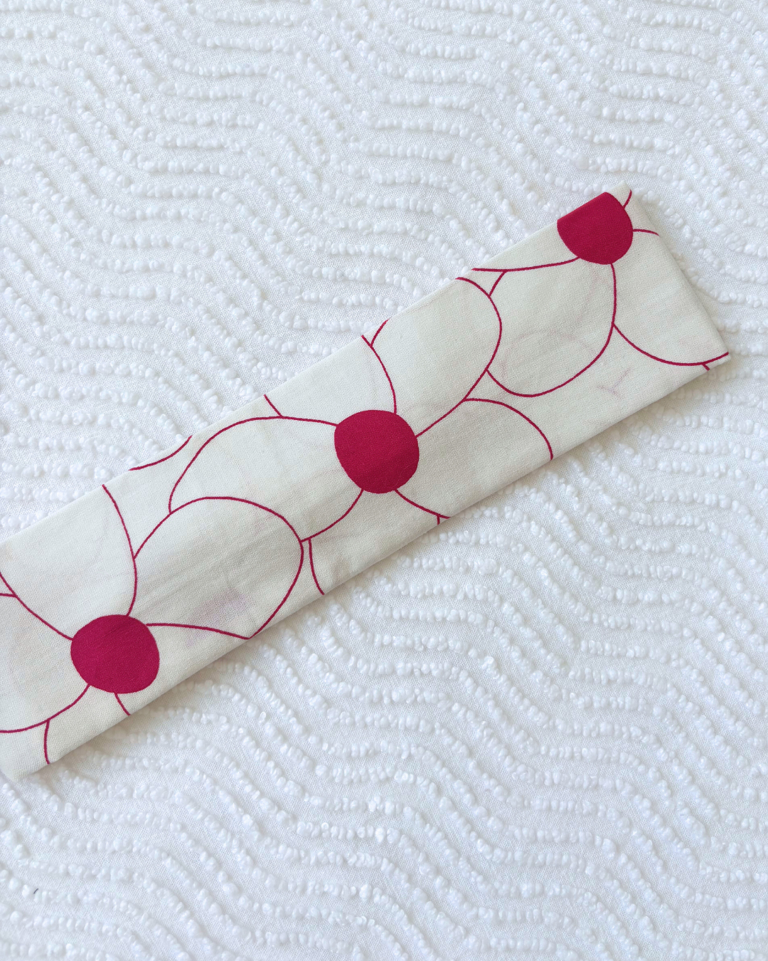 Bandeau fleurs rose fushia