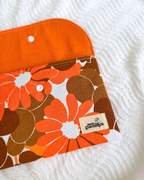 Pochette livre 70's orange