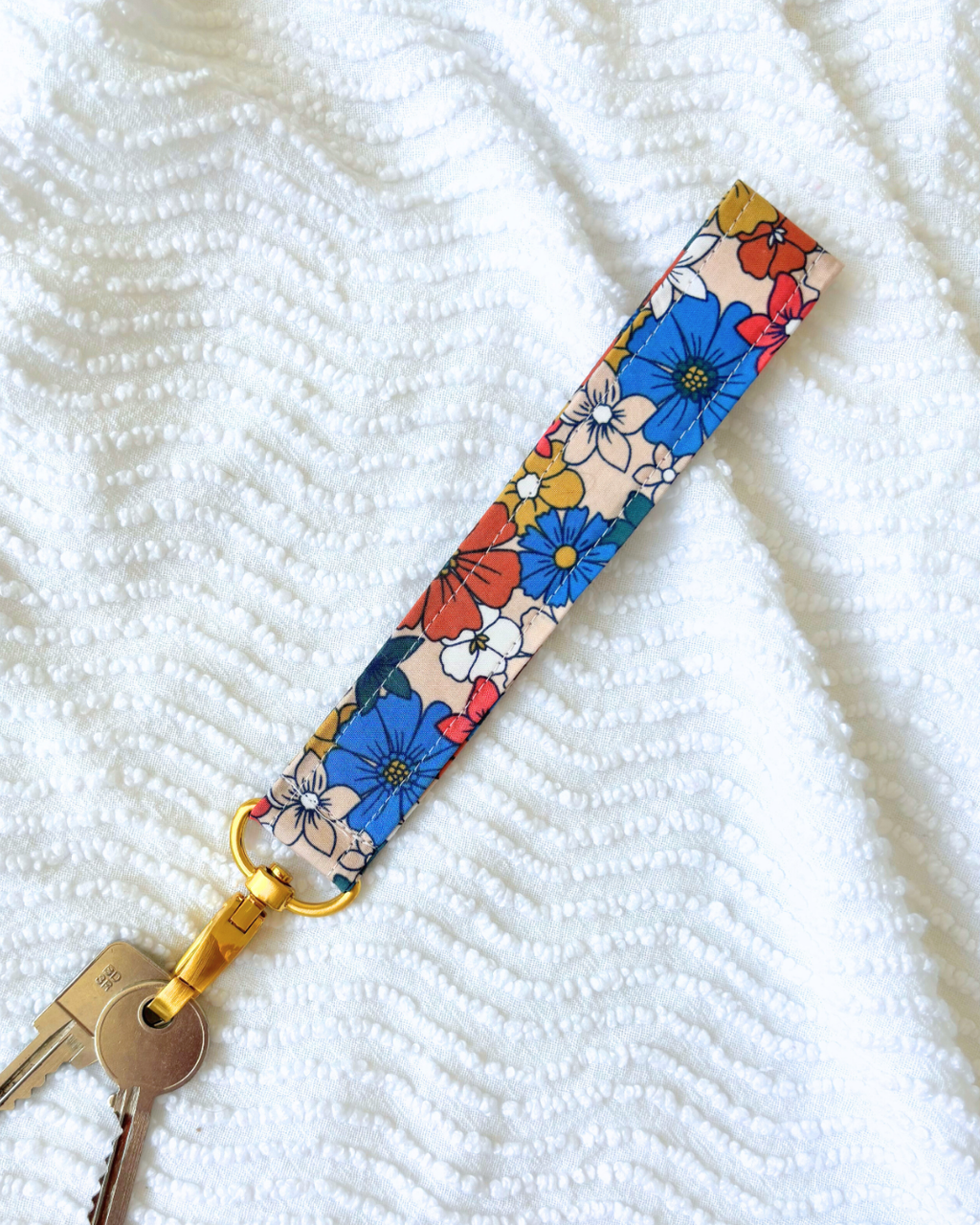 Porte-clés fleurs vintage bleu