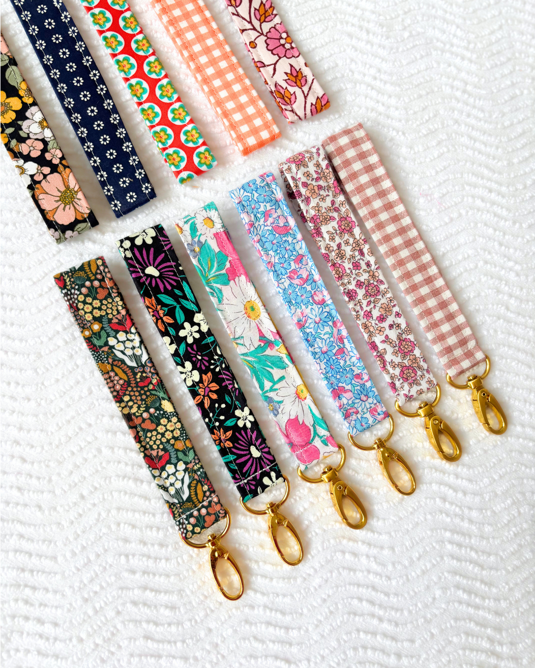 Porte-clés noir motif fleurs